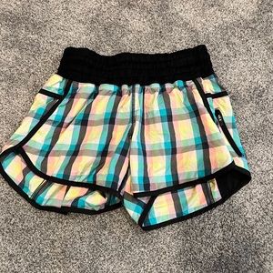 Lululemon old style tracker shorts. Pastel plaid pattern size 8